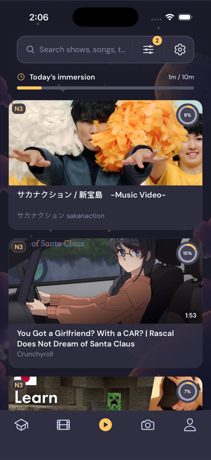 Gravity's media library showing levelled Japanese music videos and anime with an immersion timer
